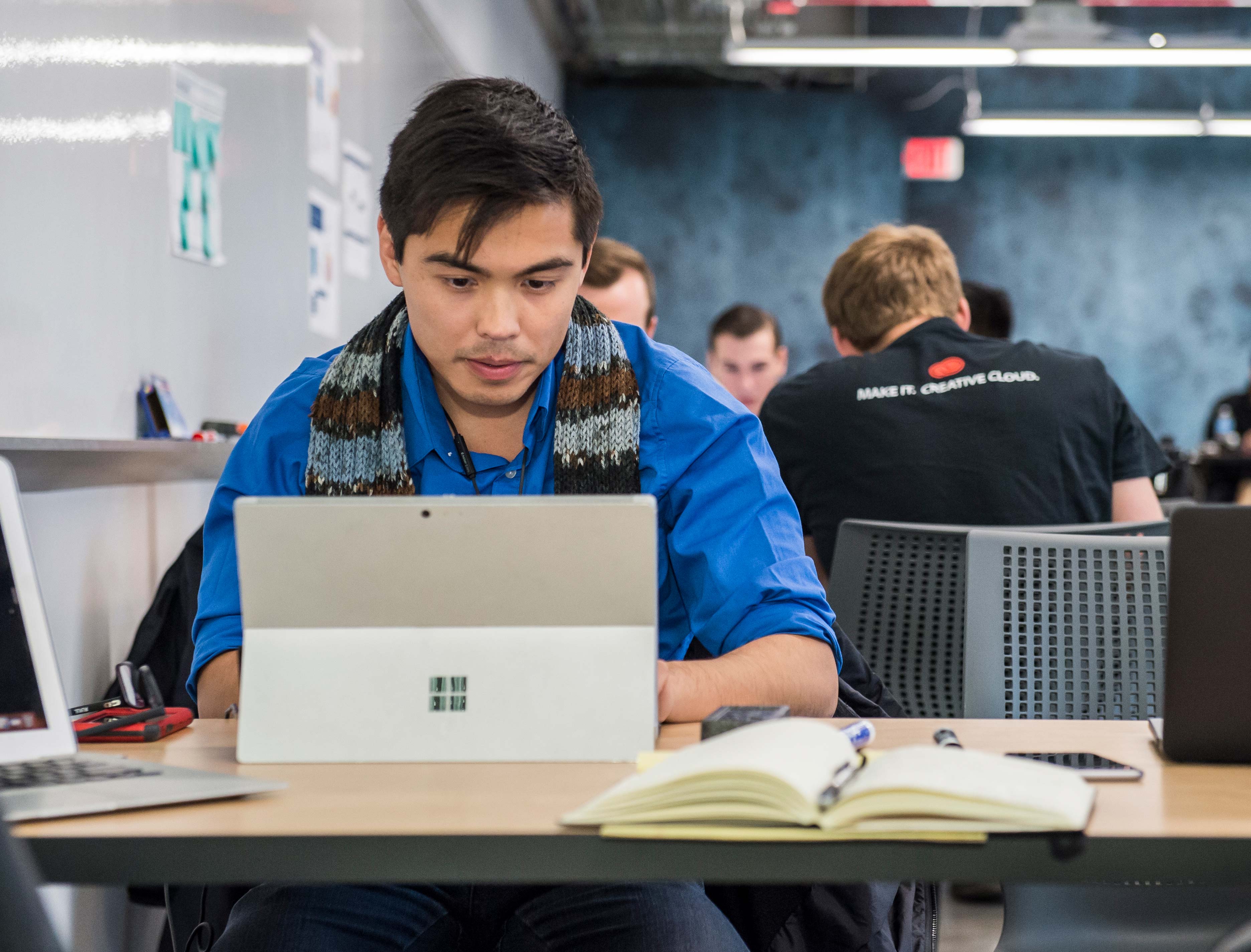 Student working at his laptop